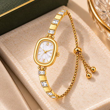 TARADE — GOLDEN RECTANGULAR CRYSTAL WATCH